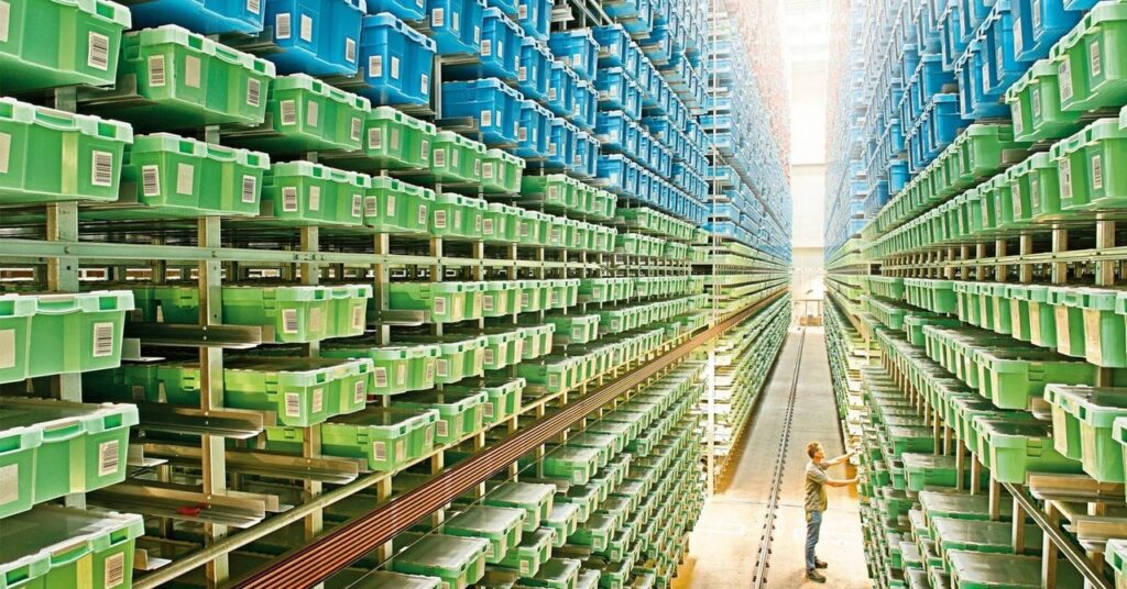 gear Boxes of Lego are stacked 23 meters high in storage rooms holding around a billion bricks in total. Robotic cranes fetch decoration or packaging parts shot in 2013 copy 1024x536 - Lego Is a Company Haunted by Its Own Plastic